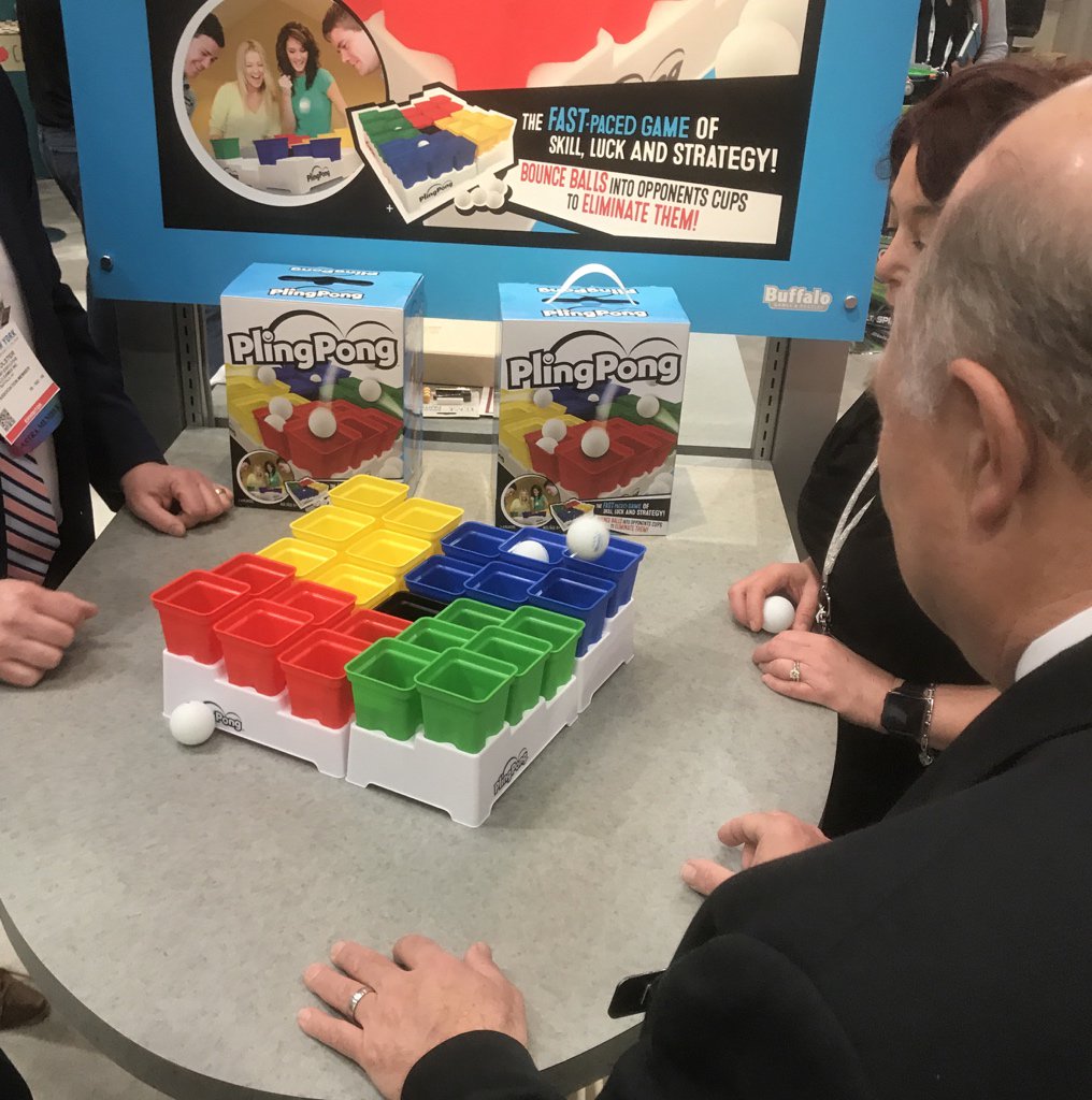 BoardGameGeek's tweet photo. Pling Pong (@buffalopuzzler) is a new “bounce the ping-pong ball” game, w/ you trying to eliminate others’ cups by landing in them. —WEM https://t.co/tI0zEsninB