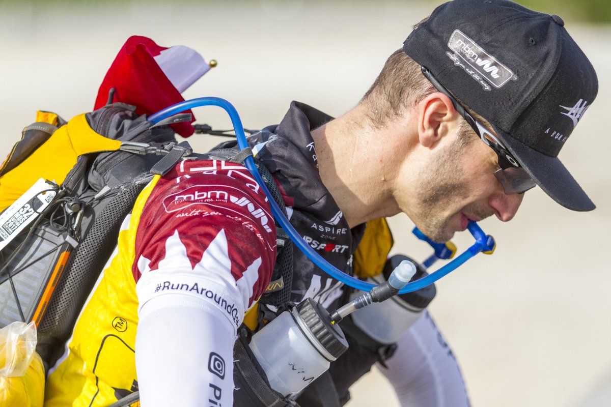 MarhabaQatar's tweet photo. Qatar Resident #PierreDaniel carries a 14-kg gear unassisted on day one of his @runaroundqatar battling higher-than-normal temperatures across the country's #EasternCoast
More details on #Marhaba
https://t.co/N3wNBBjeis
#runaroundqatar https://t.co/ilbN1ozTV6