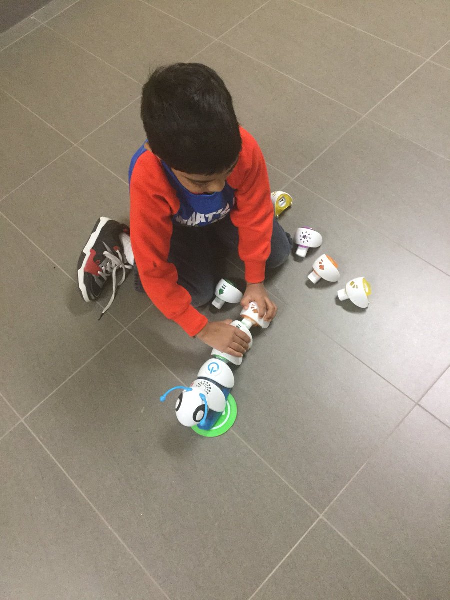 HearderAmos's tweet photo. Having fun with the #codeapillar today. The challenge: create a line of code using all the pieces, with the music piece at the end, and have it not bump into any walls! We even had a happy dance at the end @DolsonPS #PeelEML #Peel21st https://t.co/P3BRgUzXg5