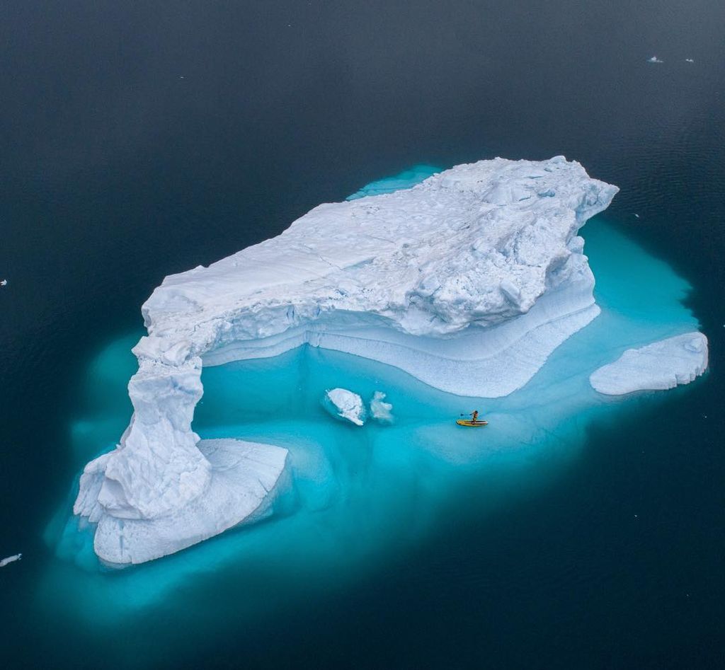 Outsideio's tweet photo. @mikelibecki paddling among the drifting #icebergs in Greenland’s #DenmarkStrait
>> Photo by @ladzinski #ROAM https://t.co/YhuzlKwIkI