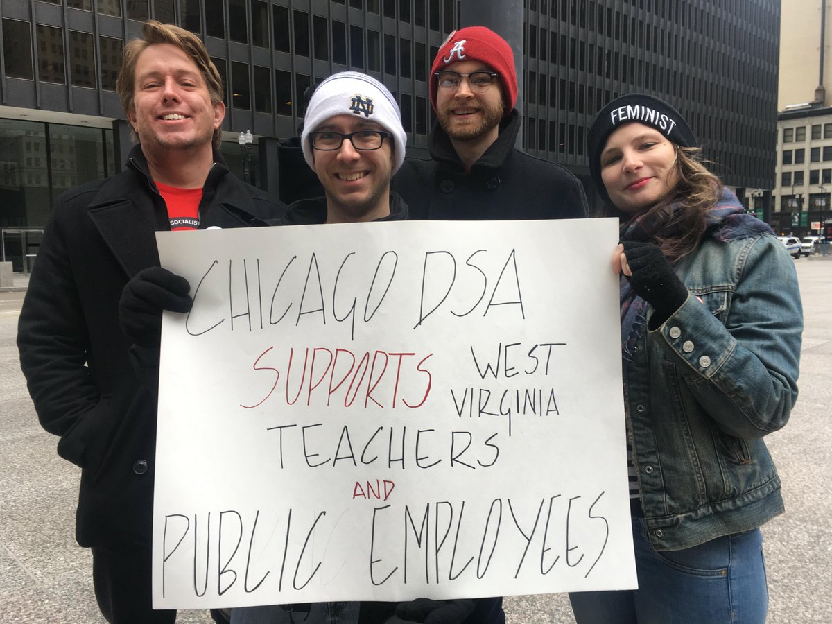 4 Chicago DSA members holding a sign "Chicago DSA Supports West Virginia Teachers and Public Employees"