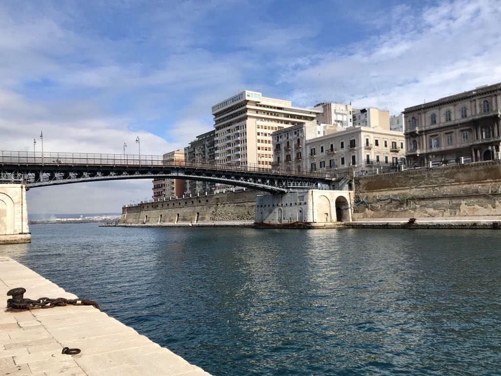 btmitalia's tweet photo. Le Colonne Doriche, il Castello Aragonese, unico perché aveva 5 torri, il canale navigabile che unisce il Mar Piccolo al Mar Grande con una prospettiva del ponte girevole, uno dei pochi al mondo.
#BTM2018 regala ai protagonisti del Fam Trip scenari mozzafiato!
#taranto https://t.co/mSRrXHSJK8