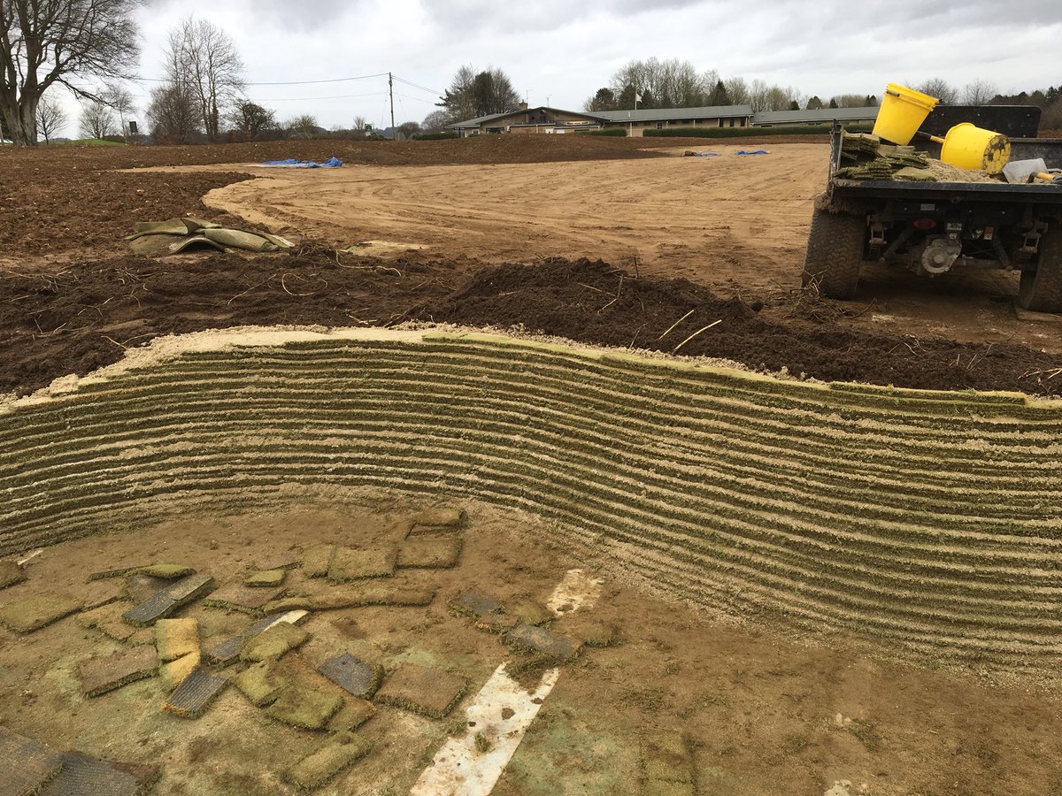 MarkSim93794378's tweet photo. Second bunker nearing completion on our new short game practice area, final turfs to be laid tomorrow and soil to be imported #ecobunker #bunkerconstruction #lovelyshape @KingsdownGC https://t.co/awXW2dPex8
