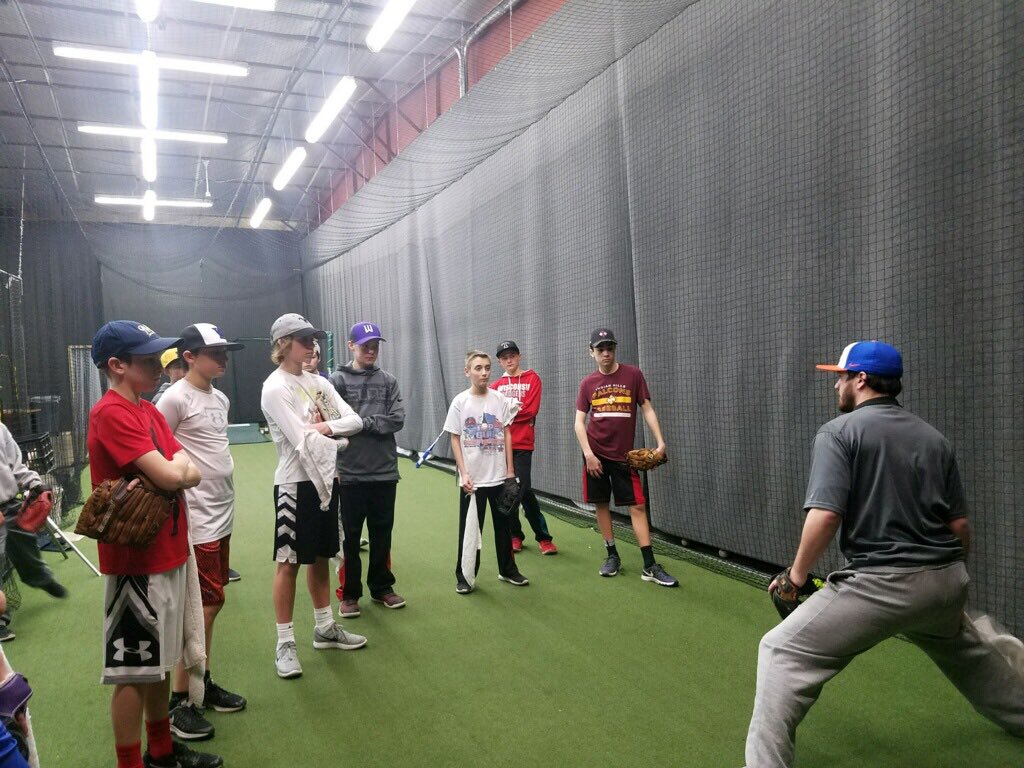 TripleImpact3's tweet photo. Coach @swilhelms11 going through some pitching instruction with our 14U team last night. Really excited for the summer with these guys! #wethrowgas https://t.co/Z6Kr3q4XkZ