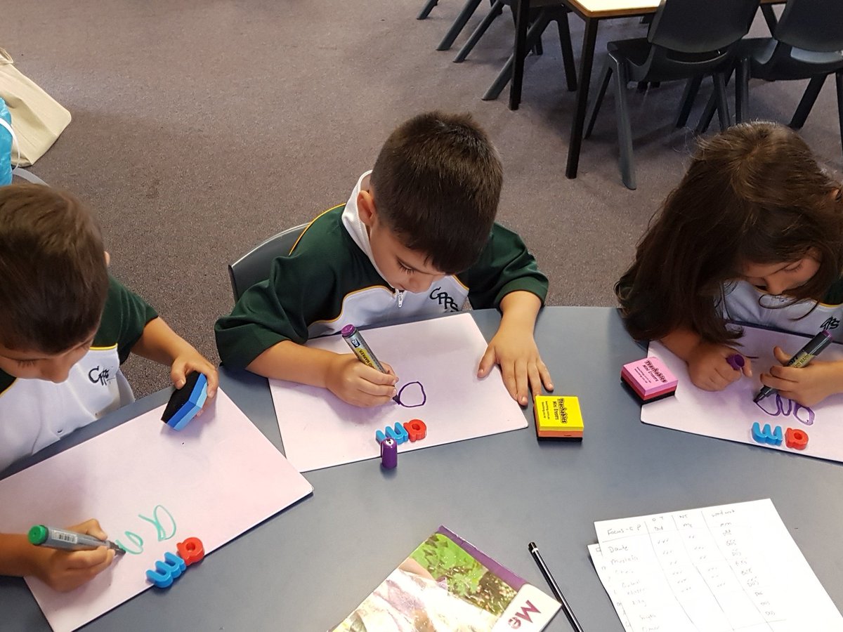 A few KS children learning to read and write a new word at the L3 table.<a href="/PsCondell/">CondellParkPS</a>