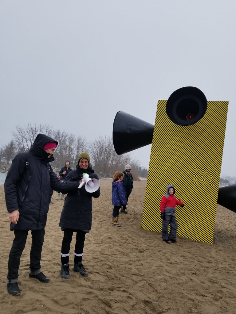 marymargaretbey's tweet photo. Our @winterstations Artists from Germany and Rotterdam telling their stories behind their exhibits! #MakesSomeNoise and #WindStation fit in perfectly w our theme of #Riot! @TorontoPFR @Park_People @EastEndArtsTO @LiveGreenTO #WinterCity https://t.co/kfKJV1kFh5