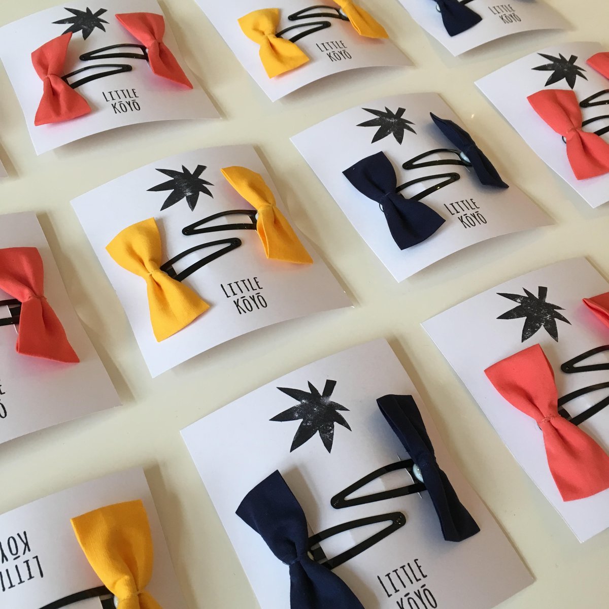LittleKoyo's tweet photo. Heads, shoulders, knees and bows. The perfect hair accessories to go with the ‘Polly’ dress. They too have a hidden leaf 🍁   #hideandseek #hairaccessories #bows #ss18 #springfashion #kidsclothing https://t.co/Oc3WPq1XEk