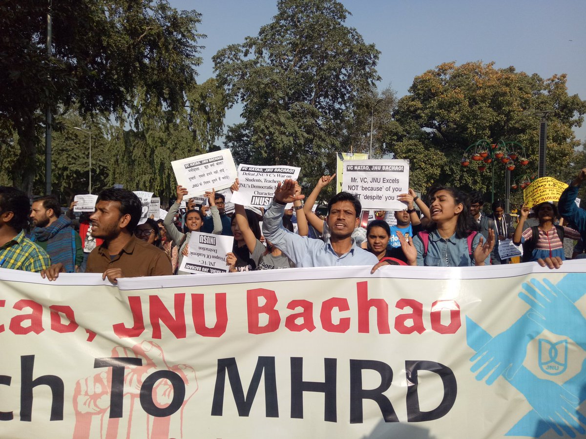KhadriSv's tweet photo. VC Hatao
JNU Bachao.
#JNU students declare Jagadesh Kumar as #NotOurVC March to MHRD saying "VC Hatao JNU Bachao"
#RollBackCompulsory_attendance
#RejuctCompulsoryAttendance
#VCHatao_JNUBachao
#RollBackAttendance
Protest@MHRD https://t.co/BhnGIqM18P