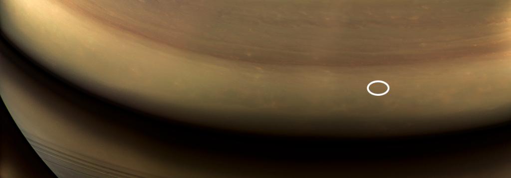 NASA's tweet photo. That tiny oval amid the swirling, stormy clouds of Saturn, shows the location where our @CassiniSaturn spacecraft entered the planet’s atmosphere on Sept. 15, 2017 – ending its remarkable 13-year exploration of the planet. More: https://t.co/FaQBmhisjk https://t.co/SuLdVJgG4G