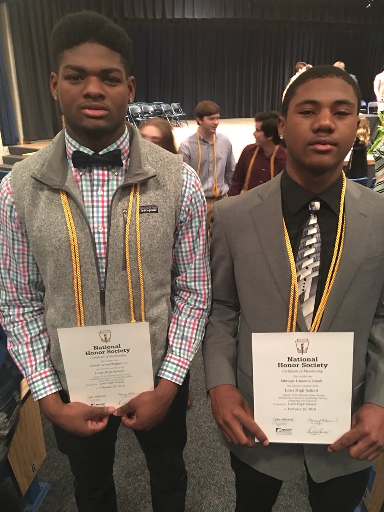 iguerin's tweet photo. Been a pretty good few weeks for Loris basketball standouts Travis Walters and Jahrique Isaiah. Undefeated regular season; All-State Class 3A; inducted into National Honor Society this morning; playing third-round home game tonight. (Pic via Adrain Grady) https://t.co/jyL5o9FYff