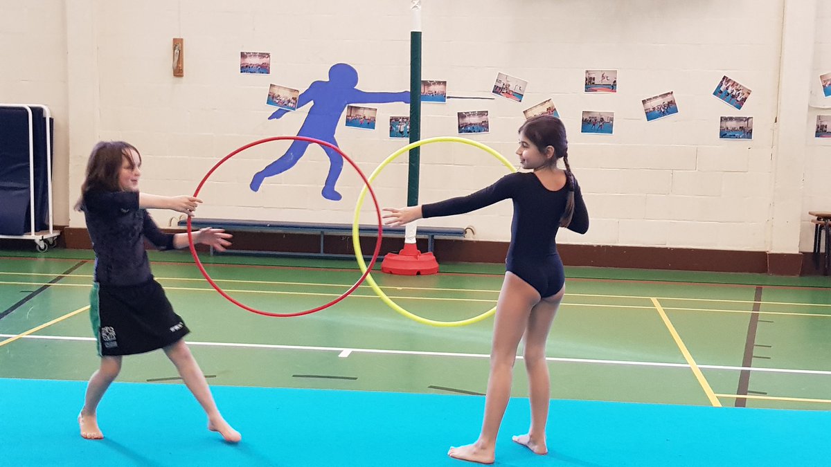 PhysEdSCPS's tweet photo. Year 4 are busy creating rhythmic gymnastics sequences using hoops. #SCPSYear4 #SCPSGym #SCPSCreate https://t.co/mf1WO3i5Ox