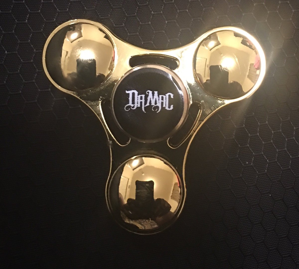 Damacmuzik's tweet photo. Oh word - new #DamacFidgetSpinners are in! Get yours at my merch table at The Damac Show Experience #DaMerch https://t.co/4TfvkxFP2g