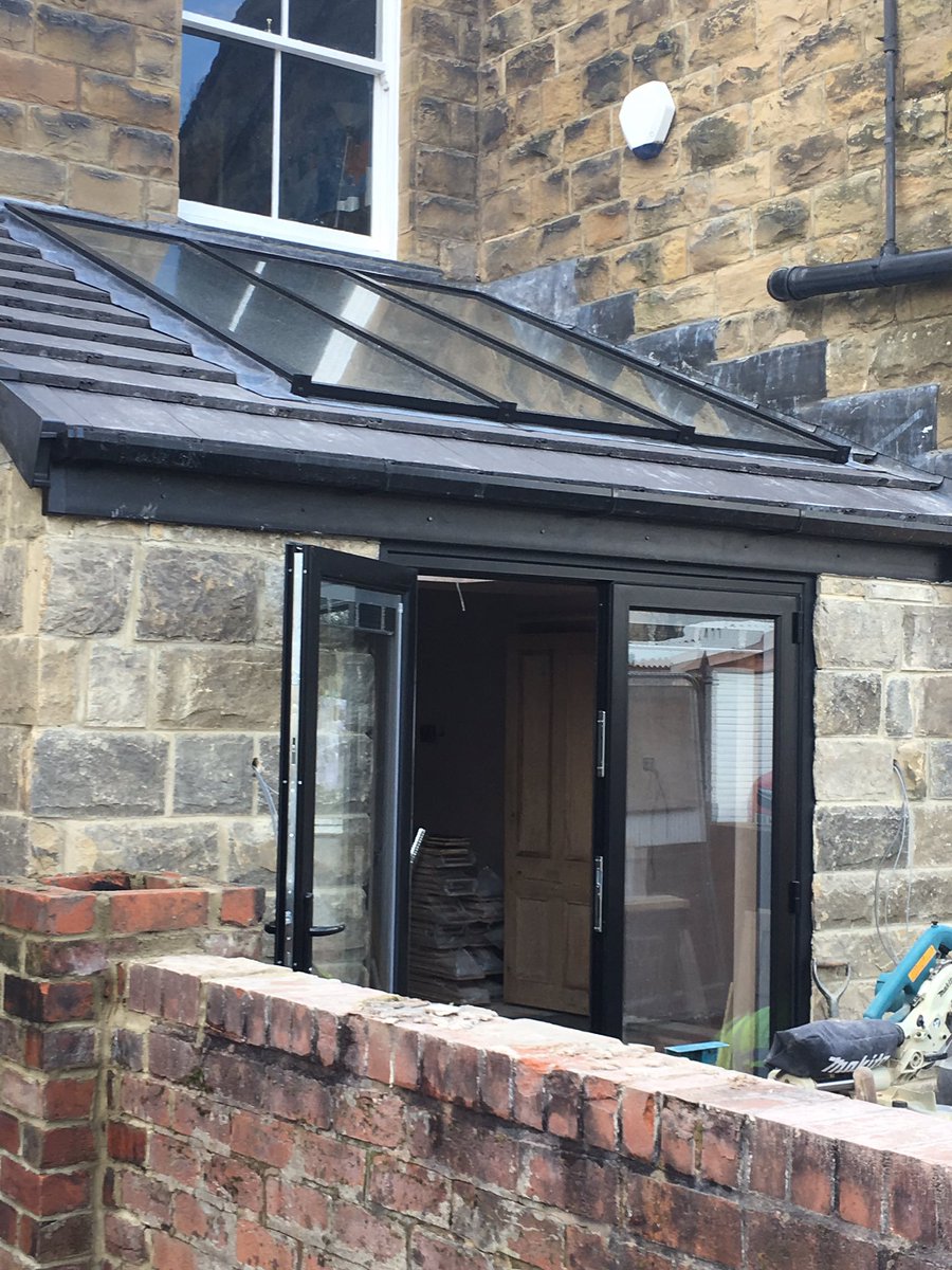 The lean-to glass roof works so well on this extension! #RoofLanterns #HomeExtension #LeantoRoofs #Glazing #ATLAS #AluminiumRoof