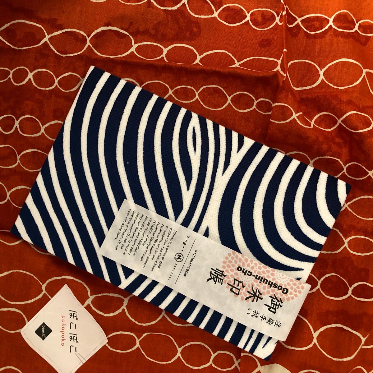 HOWorkshop's tweet photo. Tenugui covered book on a Bento scarf. Both by Nugoo. https://t.co/DCEXotQrff