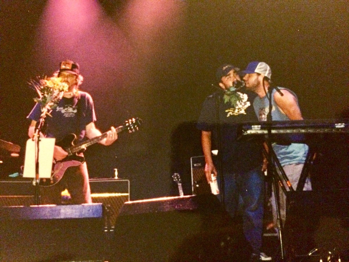coolisntcool's tweet photo. @jasonlytle Talking of staged photos... here’s some of you on stage with Mark and Kevin at V Festival, Chelmsford UK 2001. Delighted to find them in my stuff the other day. Mark came on during your set to sing on He’s Simple and then you guys helped out on Homecoming Queen. It was 100% real. https://t.co/a5rBFnw9LC