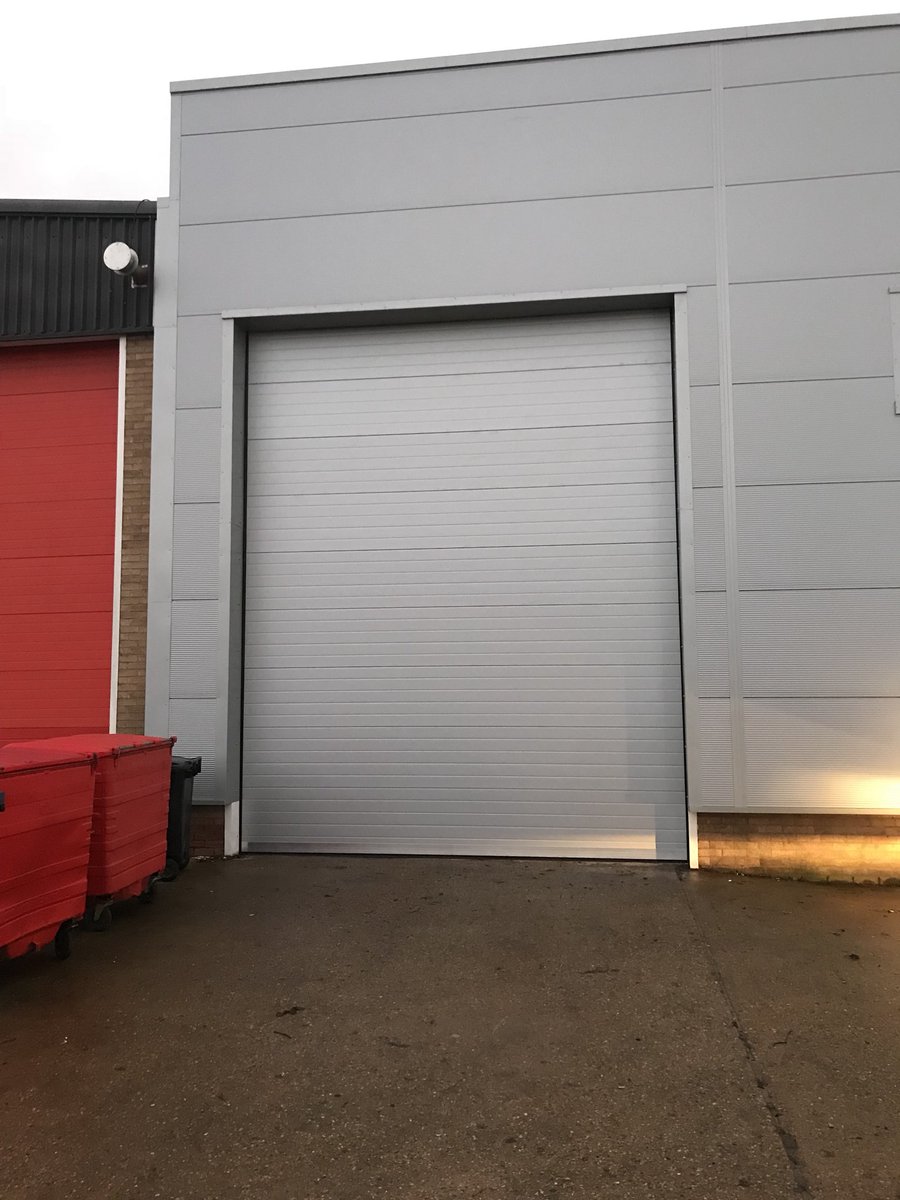 Replacement sectional overhead door