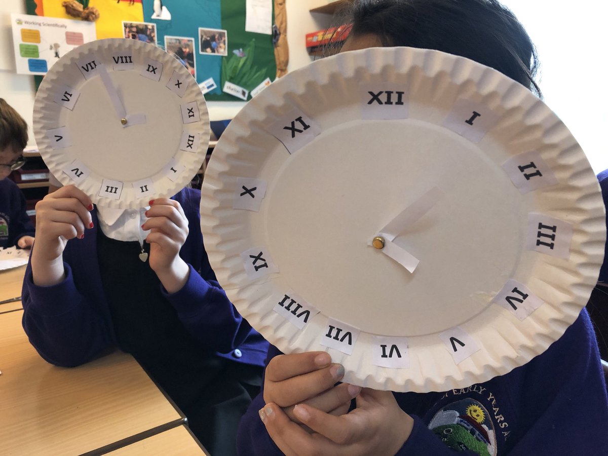 MrLovelidge's tweet photo. We have been learning how to read Roman numerals this morning and making our own clocks! #timetravellers #clockfaces https://t.co/5ef6oJIAIJ