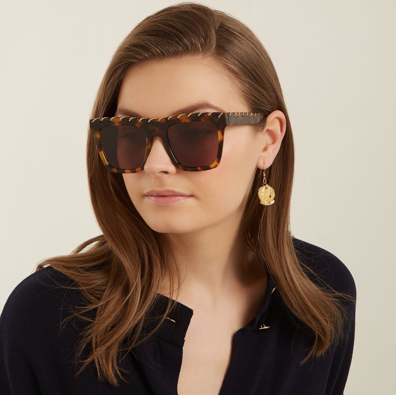 lenshop on X: A top trim of gold-tone metal chain embellishment lends a  tough-luxe accent to Stella McCartney's acetate sunglasses. The thick  square frames are set with tinted lenses. Sunglasses Stella McCartney