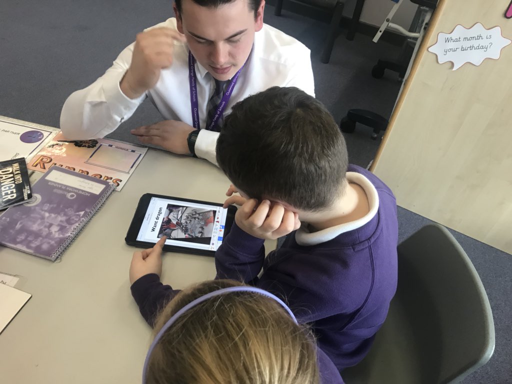 OPA_Darfield's tweet photo. Here, Sylar is working with Mia and Mr Bullingham using the Strip Design app to create a wanted poster for a dragon! #OPAImagine I have a feeling there will be lots of ‘app smashing’ going on today!! #OPAComputing #OPACurriculum https://t.co/2jVbzwbEWC