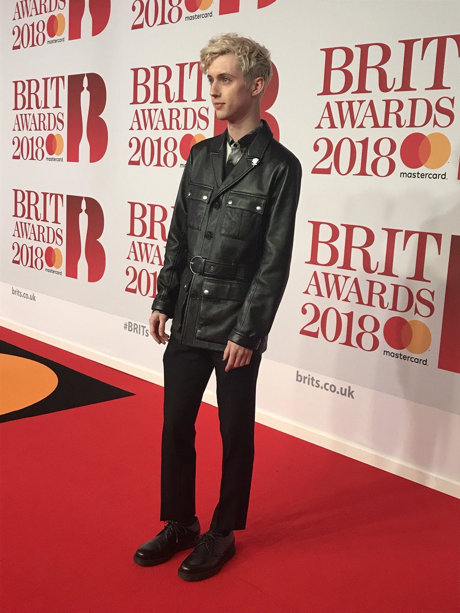 BRITs's tweet photo. OH MY MY MY! Pop Prince @troyesivan is here on the #BRITs Red Carpet 💖 https://t.co/BMLlkjMYzX
