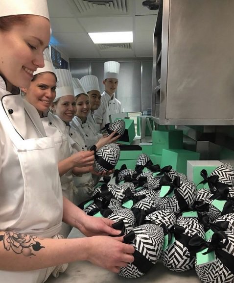 ClaridgesHotel's tweet photo. The start of our Easter Egg production line #teamwork #eastereggs #handwrapped #chevron #claridgeseggs #claridges 🥚🥚🥚 https://t.co/s9vx5DBKiQ