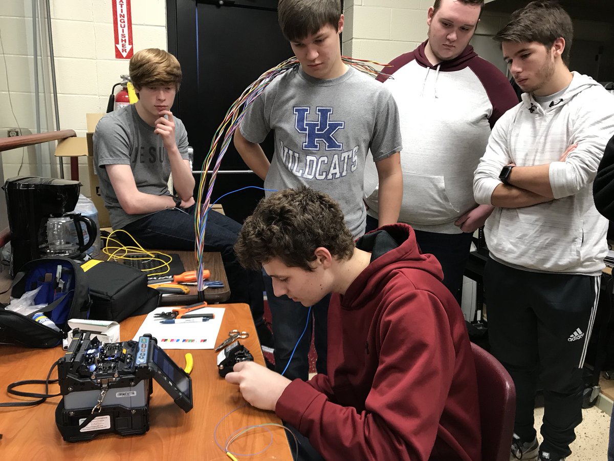 AmyIrwinBC's tweet image. BC Helpdesk students are learning to use a fusion splicer to splice and test fiber optic cables in preparation for running fiber optics to the new facility! Exciting times at BC!  #workreadycommunity #WeareBC