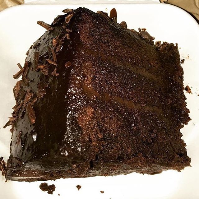 Money can't buy happiness. But it can buy one heck of a big slab of vegan chocolate gateau from us which is pretty close. 📸: <a href="/jazmynjade23/">Jazmyn Jade</a> ift.tt/2Hz4HvL