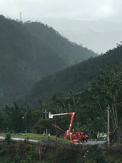 OGandE's tweet photo. Including both waves of crews, it's day 31 for the #BigOrange deployment in Puerto Rico. Power has been restored to 86 percent of residents in Arecibo region where our crews work along with @oncor and CenterPoint Energy @energyinsights. #PoweringPR #IluminandoPR https://t.co/52M5O235Uy