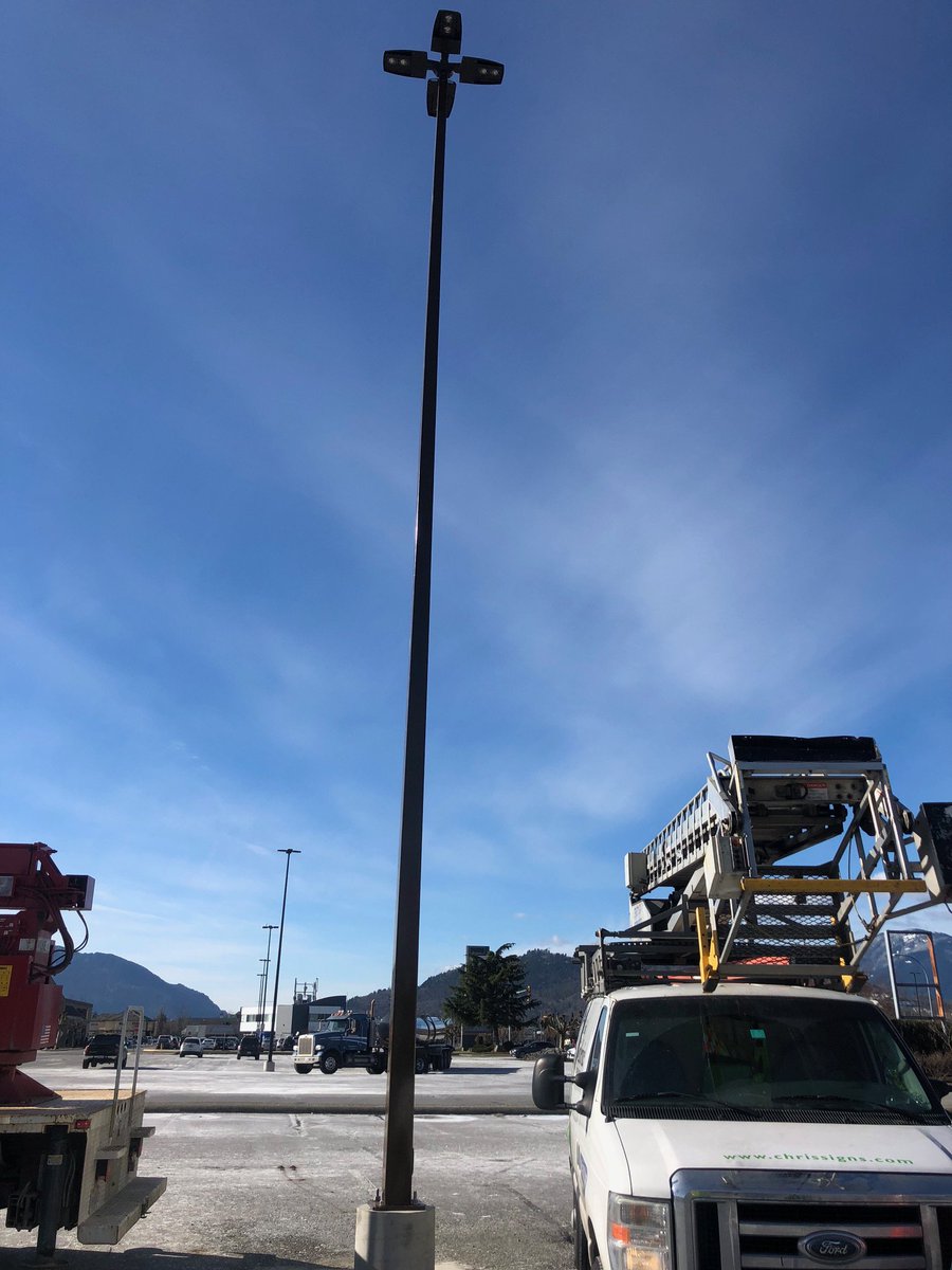 Way up high at Chilliwack Mall doing a 50' flood pole install #signs #LED #gogreen