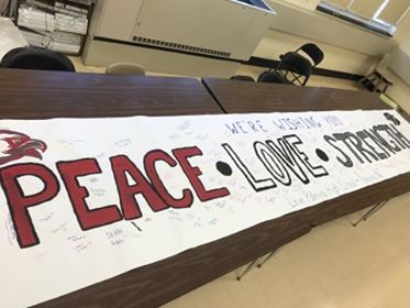 PalmyraProud's tweet photo. Today PHS Student Council members worked on a banner that the high school students signed during their lunch period to be sent to the students of Marjory Stoneman Douglas High School in Parkland, Florida as a sign of support and love. #LestWeForget #neveragain #PalmyraProud https://t.co/VhozV8zIAt