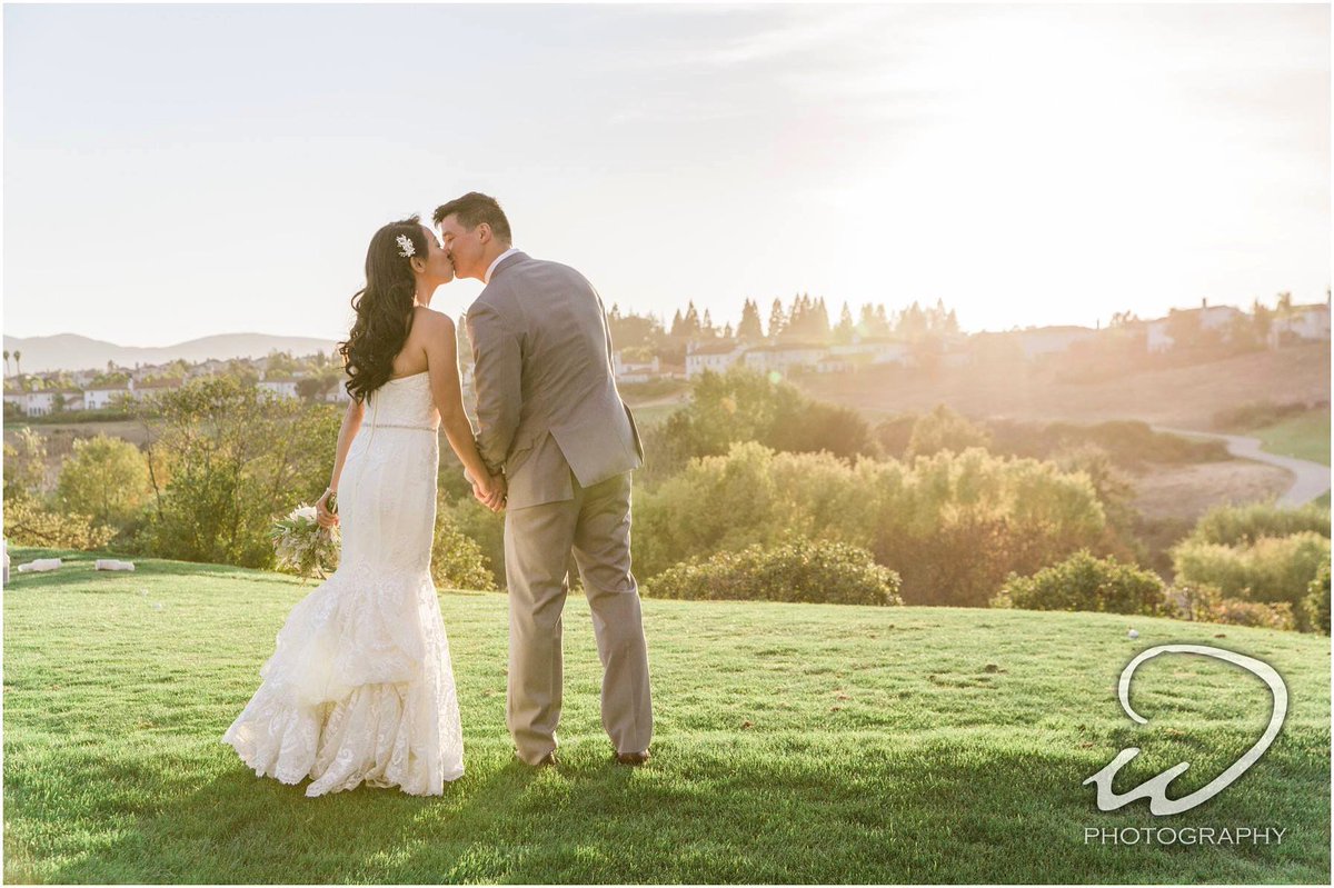 Sometimes a simple picture of a tender moment says it all! If we had postcards, this would absolutely be one of them! Can't get enough of our couples and this view of the golf course! #TheBridgesGolfClub #TBGC #WeddingVenue #GolfClubWeddings #WeddingPhoto phot cred: <a href="/rickywong_/">Ricky</a>