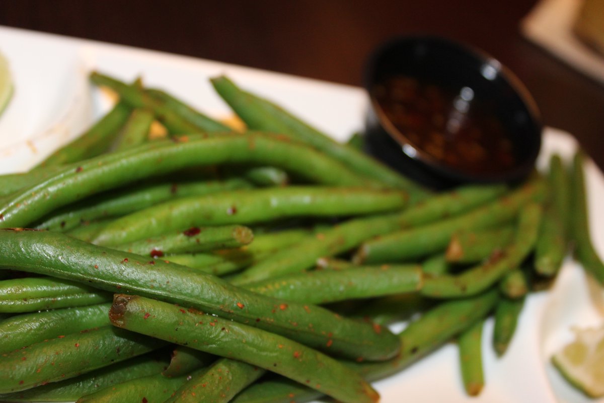 flattopgrill's tweet photo. Lightly steamed green beans tossed in Spicy Thai Salt - served with a lime wedge and soy sesame. Our Spicy Green beans! Headed to a table near you! #FTGMe https://t.co/N6cJN7wO1o