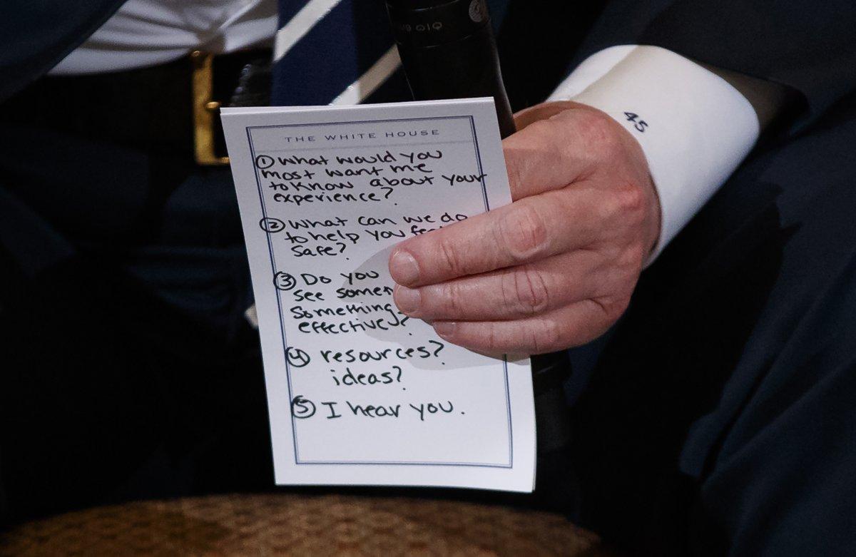 ChrisJHerman's tweet photo. The narcissistic orange toddler needed notes to remind himself to empathize with people who lost their children and loved ones. Nothing captures his lack of empathy more than this picture. It’s staggering. #ihearyou https://t.co/KuvBxiSWkN