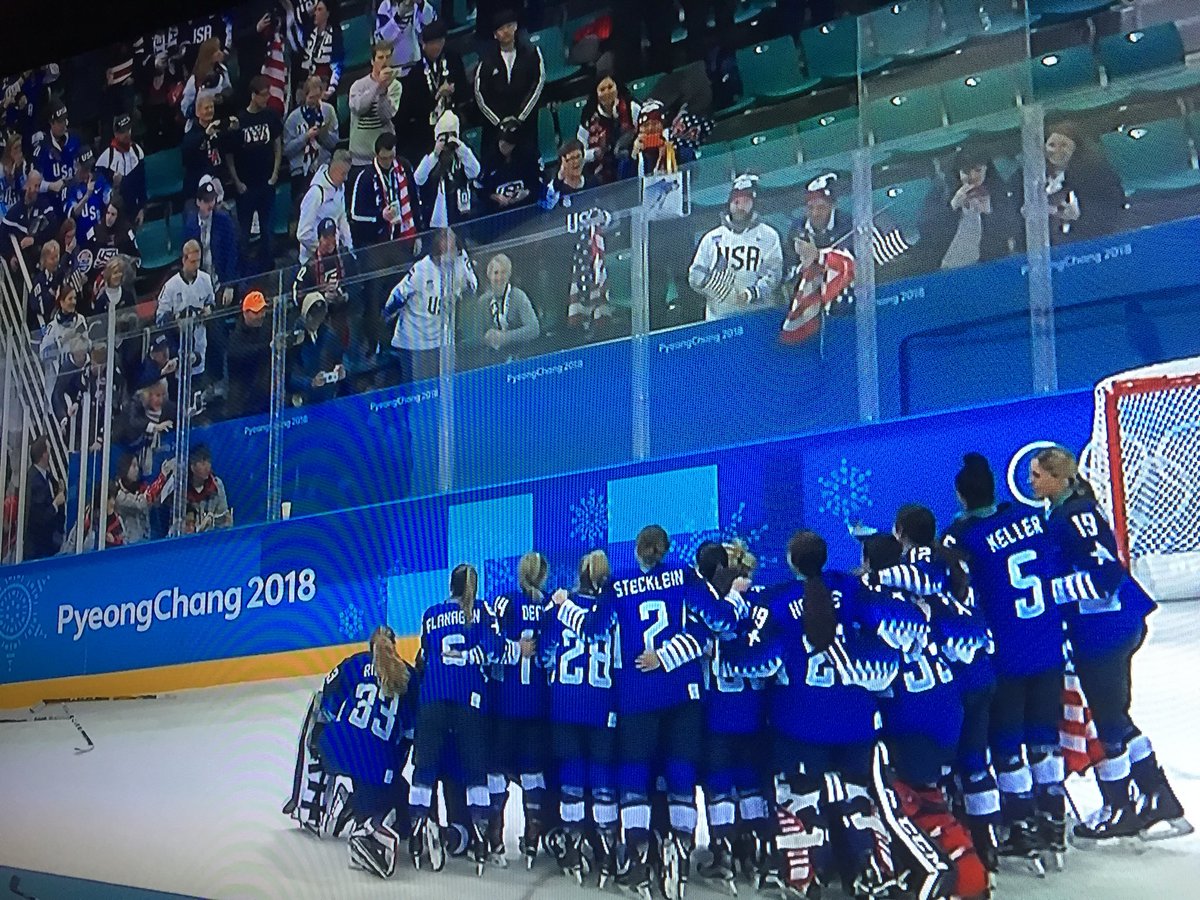 BrianHalverson's tweet photo. It doesn’t matter how old you are, a tournament is never over until you pose as a team for Moms and Dads with your medals around your necks. #UsavsCanada #GoldMedalGame #TeamUSA https://t.co/eMZCfhSEc7