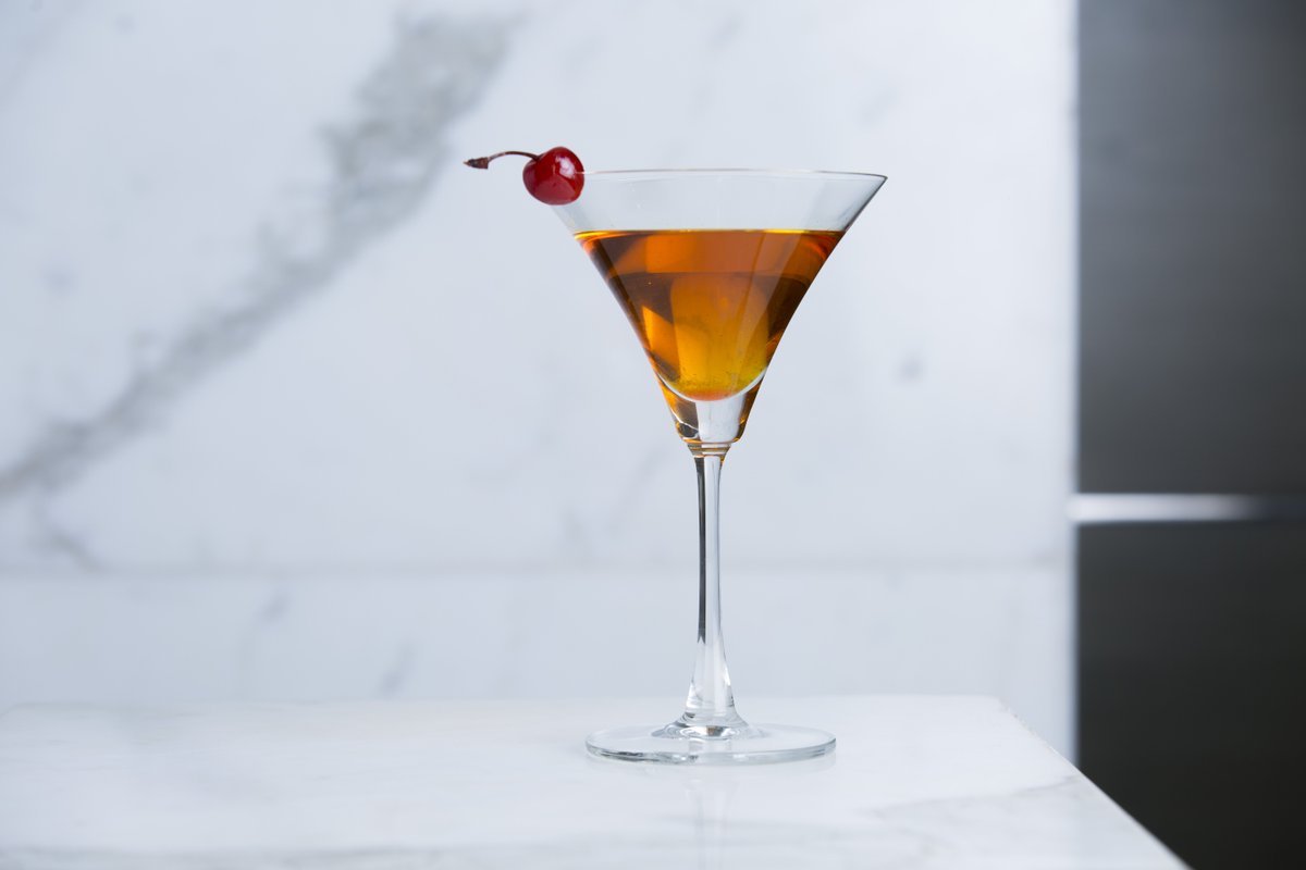 The stiff and bold Aged Vesper Martini: Tanqueray No. 10 gin, Belvedere vodka, and Martini Bianco vermouth.