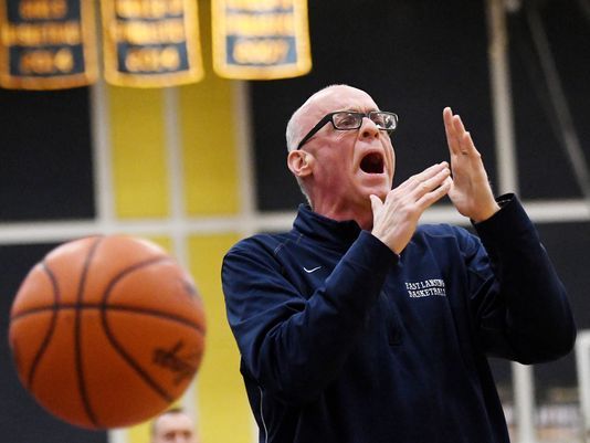 The East Lansing boys basketball team will play for its third straight CAAC Blue title without coach Steve Finamore, who has been suspended for Friday's game at Okemos. on.lsj.com/2GCDKWu via <a href="/LSJnews/">Lansing State Journal</a>