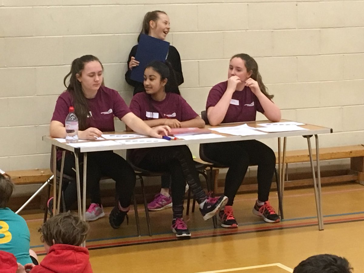 HorshamDSD's tweet photo. One of the @Millais_PE Sports Leaders delivers the welcome speech and explains what the children will be doing at today’s New Age Kurling Festival while other leaders are on the results table https://t.co/frTXE0OdPs