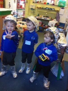 Hedgehogs class enjoying their newly made space hats as part of their topic work.