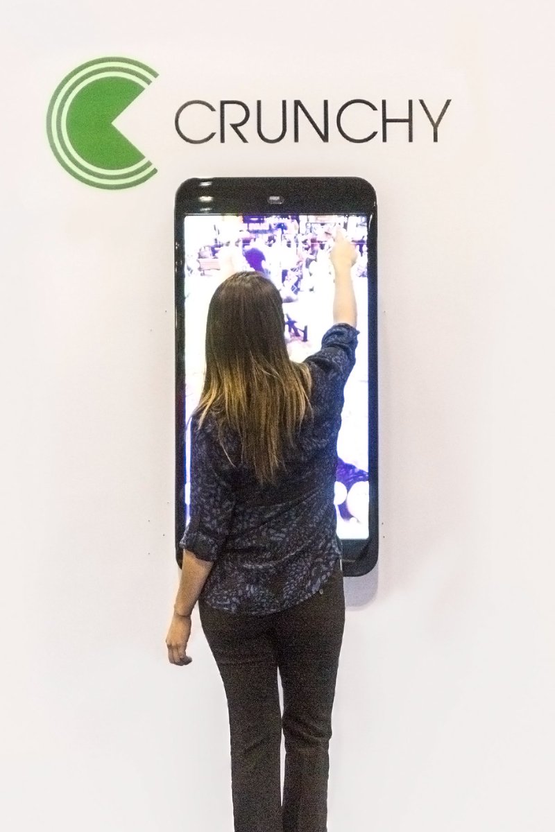 CrunchyTek's tweet image. Just a little perspective for size on our Padzilla products.  In this image, the woman is approx. 5&apos;3&quot; and she is interacting with a 40&quot; Padzilla Lite.

#FullyfunctioningiOS #crunchytech #padzilla
