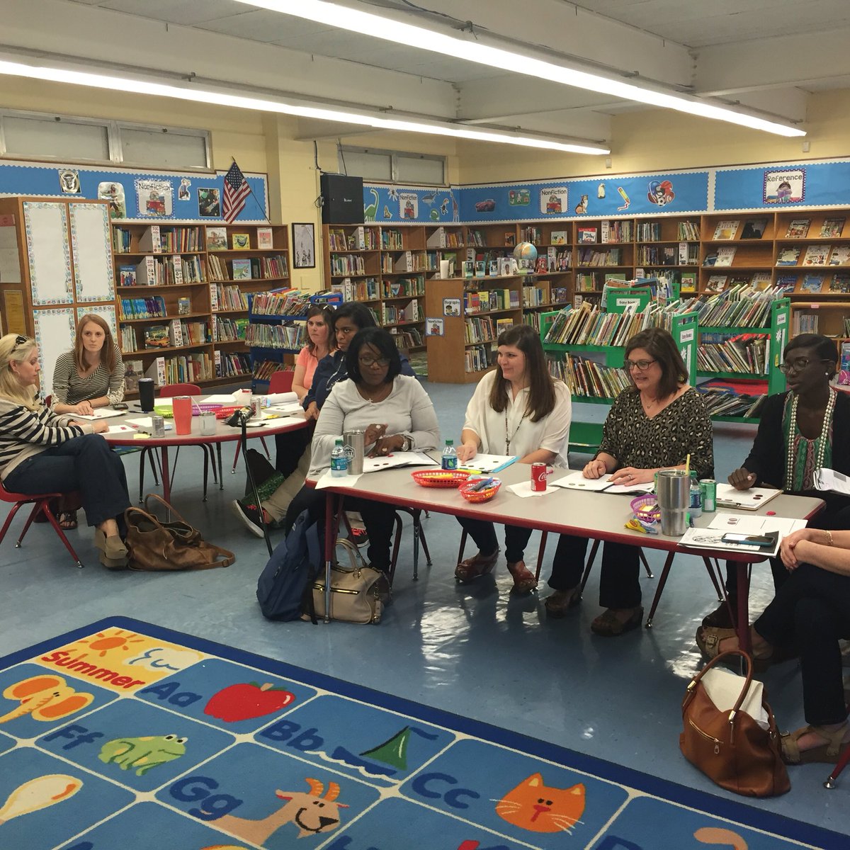 WES_Tigers's tweet photo. Teachers at WES volunteering their time after school to take a fresh look at phonics. https://t.co/45tlJgm7ya