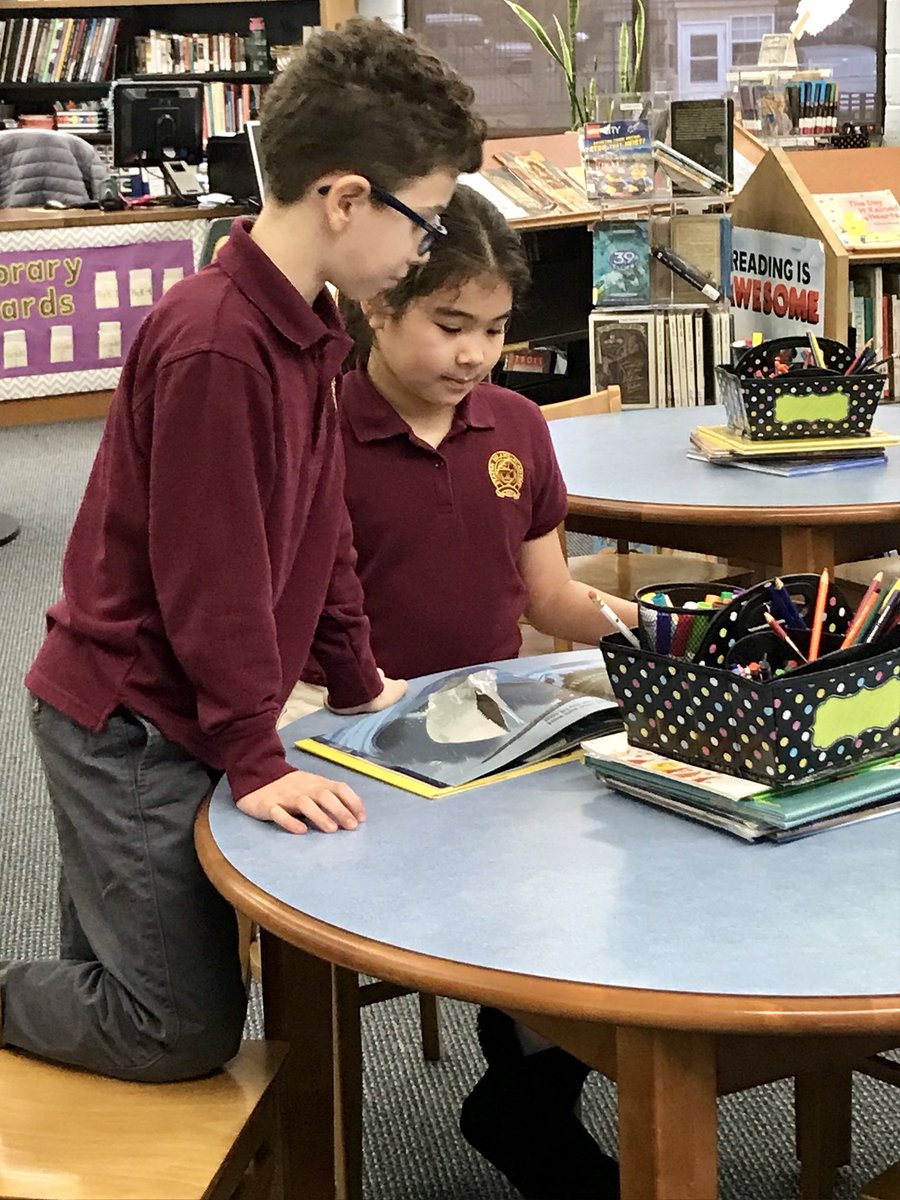 SIA_Lib's tweet photo. A few #grade4 students helping with a special project for #ReadAcrossAmerica week next week! @SI_Academy #librarylife https://t.co/2wkUUIWAcT