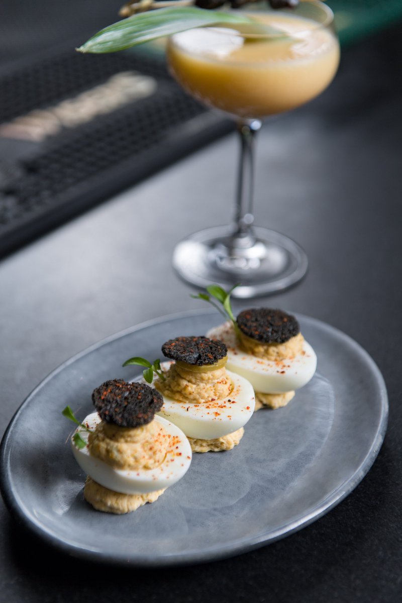 They are ready to get in your belly! Delicious nibbles to pair with some unique #whiskycocktail creations by @RayDaniel right here @Char. No 5 - Whisky BarCrab Deviled Eggs I Cadillac Dreams Whisky Cocktail