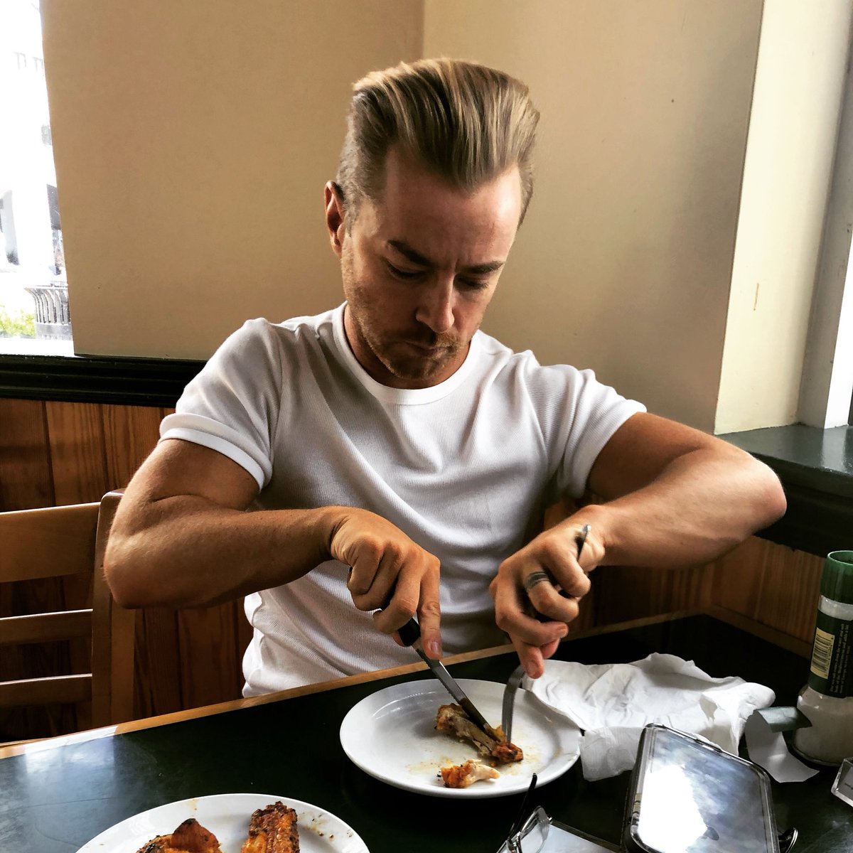 therealec3's tweet photo. Watching @wwemaverick eat chicken wings with a fork and knife. #dudedate #blackpanther https://t.co/eEwjSpww7i