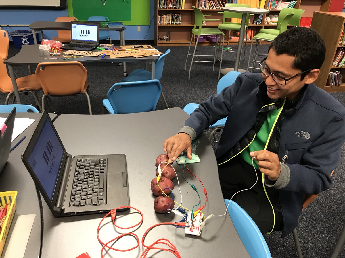 BluebonnetRRISD's tweet photo. Kids and parents tinkering with Makey Makeys in the library - having fun with potatoes @BBssoto1 @RRISDTech #rrisdtech #rrisd1family https://t.co/7WgAJcKKqD