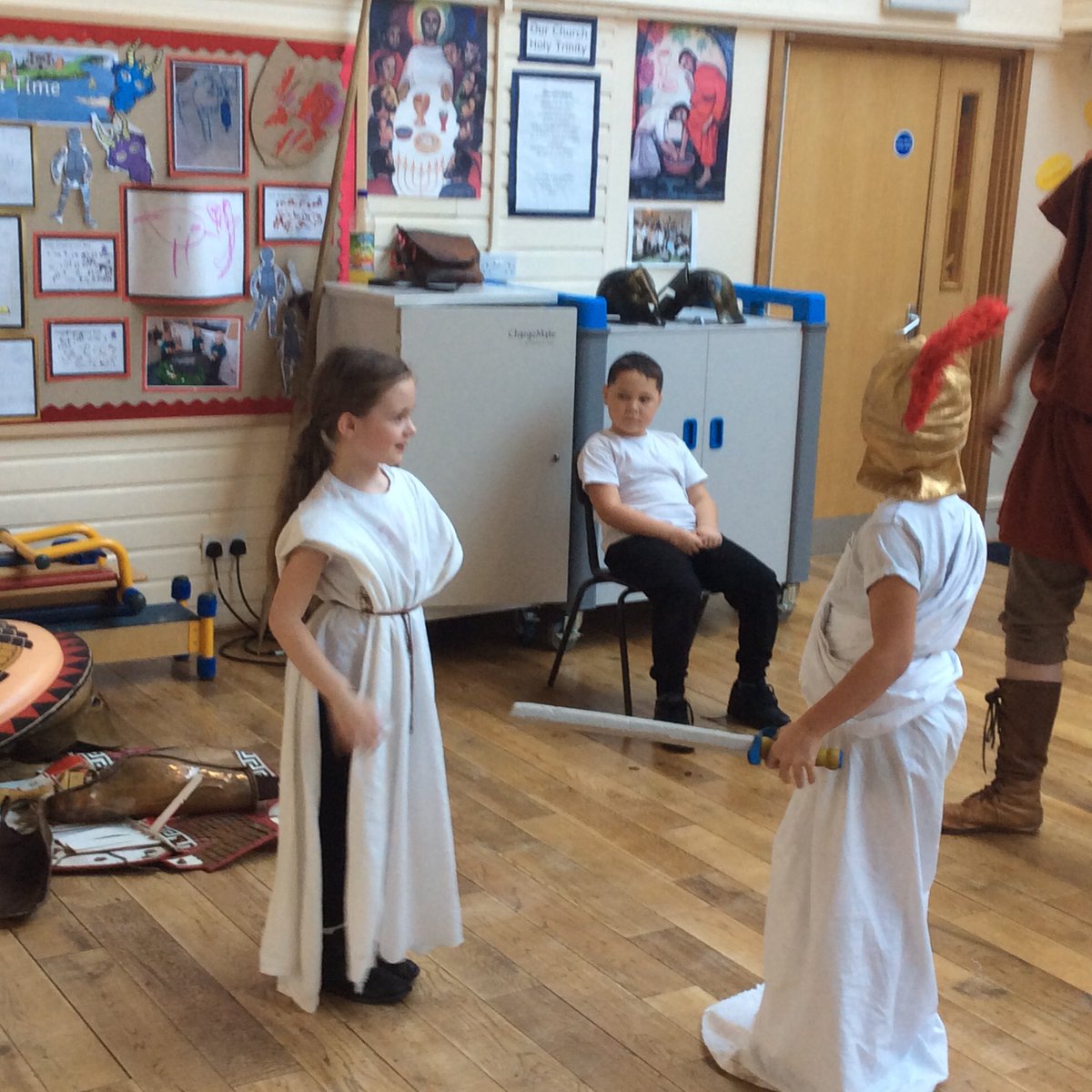 Trinity_Croft's tweet photo. Ancient Greece workshop day occurred today. Thank you Portals to the Past....we all had a fantastic day dressing up, solving puzzles, playing games, acting and attacking the city of Troy! https://t.co/cMi3zKMLOY