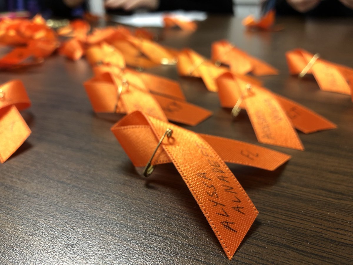EmilyMaherTV's tweet photo. A group of @atherton_high students are making orange ribbons in support of school shooting victims. They’re going to hand them out before school tomorrow. https://t.co/YQQDILqKk0