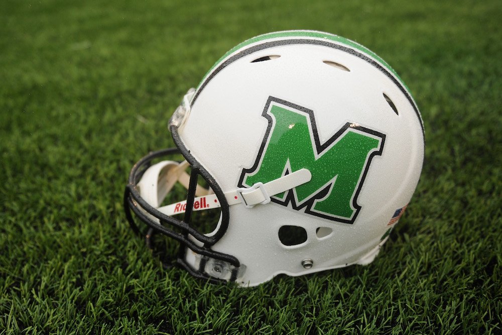 BleacherReport's tweet photo. Marshall DT Larry Aaron, 19, dies due to complications from a gunshot wound on NYE that left him paralyzed https://t.co/uNTeWGckUx https://t.co/tBPEK6eDbp