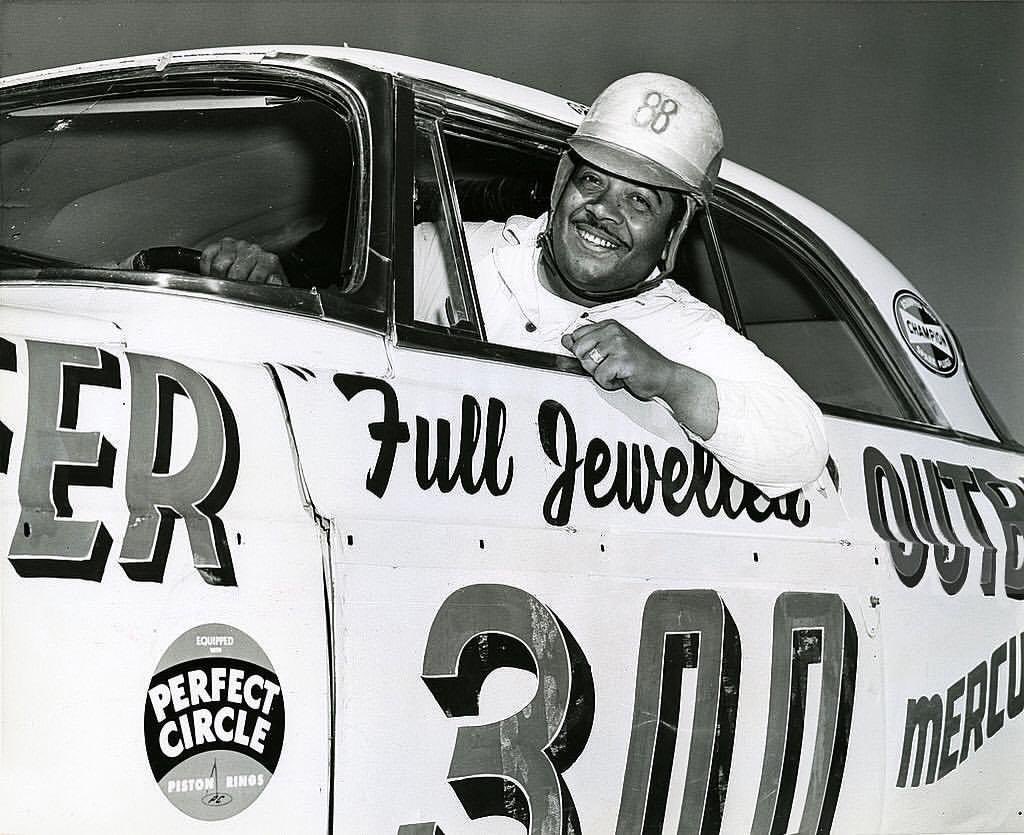 The next driver is the second African American to compete at the National Level. Charlie Scott (19??-1984) the Forest Park, GA native raced for car owner Carl Kiekhaefer in 1956 at Daytona Beach Road Course. He drove his Chrysler 300 to a 19th place finish in his only start.