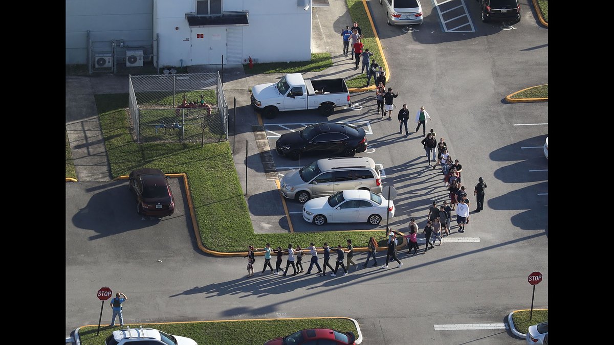 cnnbrk's tweet photo. The school resource deputy at the high school where the Florida shooting occurred waited outside the school building as the shooting unfolded https://t.co/ljBALUSnkW https://t.co/upmVDep4X7
