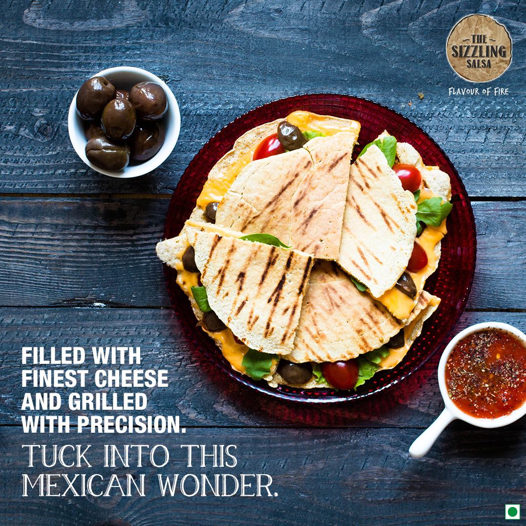 rajhans_group's tweet photo. #Quesadilla: Filled with finest cheese and grilled with precision. Tuck into this #Mexican wonder. #SizzlingSalsa #Surat #RajhansHospitality #RajhansDesaiJainGroup https://t.co/27XCmxm1bY